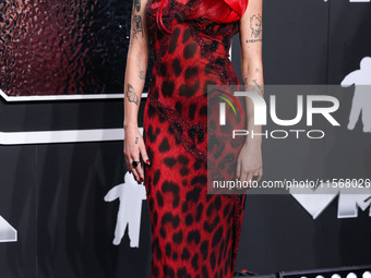 Halsey wearing vintage Versace arrives at the 2024 MTV Video Music Awards held at UBS Arena on September 11, 2024 in Elmont, New York, Unite...