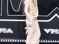 Lisa, Lalisa Manobal, Blackpink wearing Mugler arrives at the 2024 MTV Video Music Awards held at UBS Arena on September 11, 2024 in Elmont,...