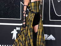 Taylor Swift wearing Dior arrives at the 2024 MTV Video Music Awards held at UBS Arena on September 11, 2024 in Elmont, New York, United Sta...