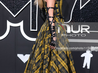 Taylor Swift wearing Dior arrives at the 2024 MTV Video Music Awards held at UBS Arena on September 11, 2024 in Elmont, New York, United Sta...