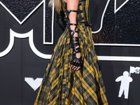 Taylor Swift wearing Dior arrives at the 2024 MTV Video Music Awards held at UBS Arena on September 11, 2024 in Elmont, New York, United Sta...