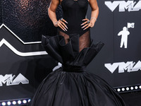 Megan Thee Stallion wearing Nicole + Felicia arrives at the 2024 MTV Video Music Awards held at UBS Arena on September 11, 2024 in Elmont, N...