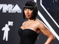 Megan Thee Stallion wearing Nicole + Felicia arrives at the 2024 MTV Video Music Awards held at UBS Arena on September 11, 2024 in Elmont, N...