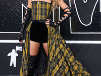 Taylor Swift wearing Dior arrives at the 2024 MTV Video Music Awards held at UBS Arena on September 11, 2024 in Elmont, New York, United Sta...