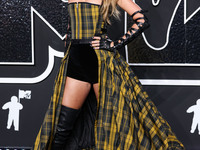 Taylor Swift wearing Dior arrives at the 2024 MTV Video Music Awards held at UBS Arena on September 11, 2024 in Elmont, New York, United Sta...