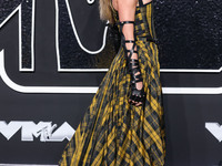 Taylor Swift wearing Dior arrives at the 2024 MTV Video Music Awards held at UBS Arena on September 11, 2024 in Elmont, New York, United Sta...