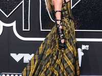 Taylor Swift wearing Dior arrives at the 2024 MTV Video Music Awards held at UBS Arena on September 11, 2024 in Elmont, New York, United Sta...