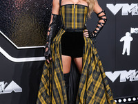 Taylor Swift wearing Dior arrives at the 2024 MTV Video Music Awards held at UBS Arena on September 11, 2024 in Elmont, New York, United Sta...