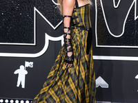 Taylor Swift wearing Dior arrives at the 2024 MTV Video Music Awards held at UBS Arena on September 11, 2024 in Elmont, New York, United Sta...