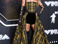 Taylor Swift wearing Dior arrives at the 2024 MTV Video Music Awards held at UBS Arena on September 11, 2024 in Elmont, New York, United Sta...