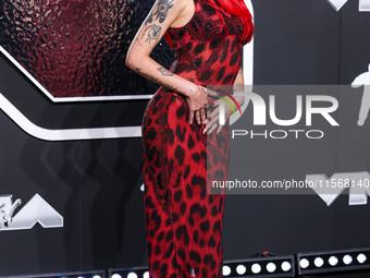 Halsey wearing vintage Versace arrives at the 2024 MTV Video Music Awards held at UBS Arena on September 11, 2024 in Elmont, New York, Unite...