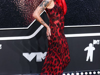 Halsey wearing vintage Versace arrives at the 2024 MTV Video Music Awards held at UBS Arena on September 11, 2024 in Elmont, New York, Unite...