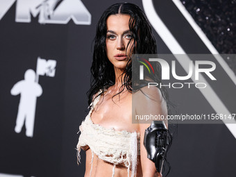 Katy Perry wearing Who Decides War arrives at the 2024 MTV Video Music Awards held at UBS Arena on September 11, 2024 in Elmont, New York, U...