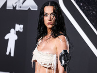 Katy Perry wearing Who Decides War arrives at the 2024 MTV Video Music Awards held at UBS Arena on September 11, 2024 in Elmont, New York, U...