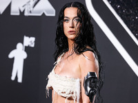 Katy Perry wearing Who Decides War arrives at the 2024 MTV Video Music Awards held at UBS Arena on September 11, 2024 in Elmont, New York, U...