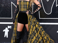 Taylor Swift wearing Dior arrives at the 2024 MTV Video Music Awards held at UBS Arena on September 11, 2024 in Elmont, New York, United Sta...