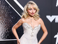 Sabrina Carpenter wearing a vintage Bob Mackie dress from Tab Vintage arrives at the 2024 MTV Video Music Awards held at UBS Arena on Septem...