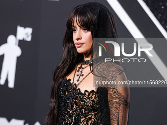 Camila Cabello wearing a Tony Ward look with Loree Rodkin jewelry arrives at the 2024 MTV Video Music Awards held at UBS Arena on September...