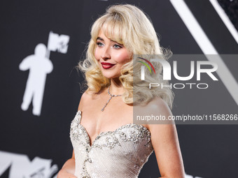 Sabrina Carpenter wearing a vintage Bob Mackie dress from Tab Vintage arrives at the 2024 MTV Video Music Awards held at UBS Arena on Septem...