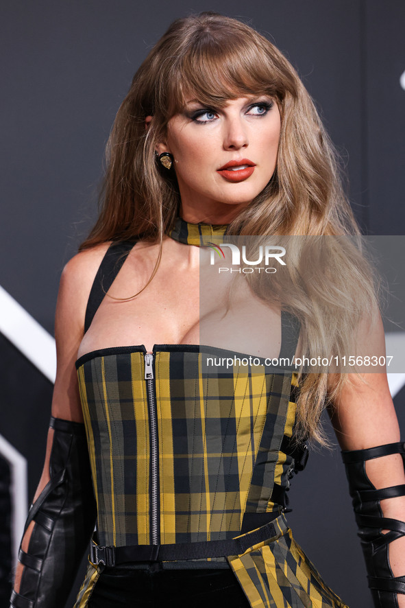 Taylor Swift wearing Dior arrives at the 2024 MTV Video Music Awards held at UBS Arena on September 11, 2024 in Elmont, New York, United Sta...