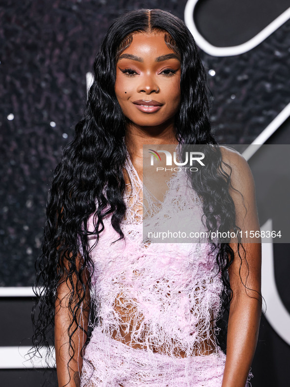 Lola Brooke arrives at the 2024 MTV Video Music Awards held at UBS Arena on September 11, 2024 in Elmont, New York, United States. 