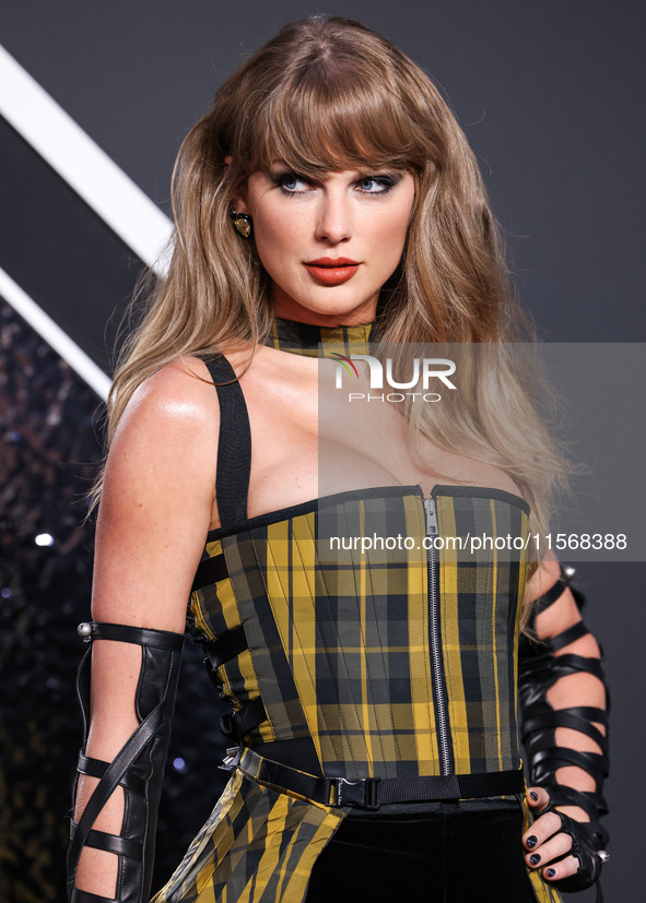 Taylor Swift wearing Dior arrives at the 2024 MTV Video Music Awards held at UBS Arena on September 11, 2024 in Elmont, New York, United Sta...