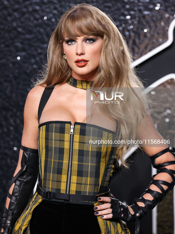 Taylor Swift wearing Dior arrives at the 2024 MTV Video Music Awards held at UBS Arena on September 11, 2024 in Elmont, New York, United Sta...