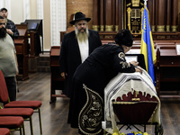 Ukrainian Jews, relatives, and friends attend a farewell ceremony for the late Ukrainian serviceman Matisyahu (Anton) Samborskiy at the Cent...