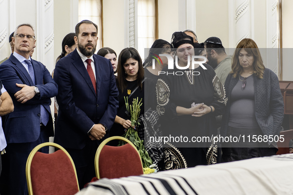 Ukrainian Jews, relatives, and friends attend a farewell ceremony for late Ukrainian serviceman Matisyahu (Anton) Samborskiy at the Central...