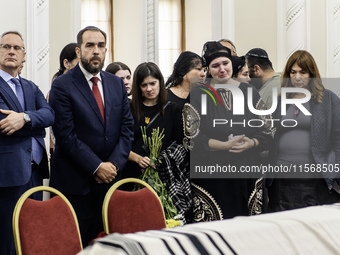 Ukrainian Jews, relatives, and friends attend a farewell ceremony for late Ukrainian serviceman Matisyahu (Anton) Samborskiy at the Central...