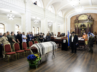 Ukrainian Jews, relatives, and friends attend a farewell ceremony for the late Ukrainian serviceman Matisyahu (Anton) Samborskiy at the Cent...