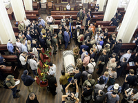 Ukrainian Jews, relatives, and friends attend a farewell ceremony for the late Ukrainian serviceman Matisyahu (Anton) Samborskiy at the Cent...