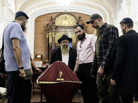 Ukrainian Jews, relatives, and friends attend a farewell ceremony for the late Ukrainian serviceman Matisyahu (Anton) Samborskiy at the Cent...