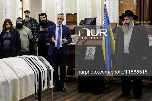 Ambassador of Israel to Ukraine Michael Brodsky (2R) attends a farewell ceremony for late Ukrainian serviceman Matisyahu (Anton) Samborskiy...