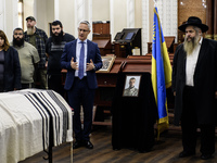 Ambassador of Israel to Ukraine Michael Brodsky (2R) attends a farewell ceremony for late Ukrainian serviceman Matisyahu (Anton) Samborskiy...