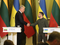 President of Ukraine Volodymyr Zelenskyy and President of Lithuania Gitanas Nauseda shake hands during a joint press conference in Kyiv, Ukr...