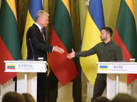 President of Ukraine Volodymyr Zelenskyy and President of Lithuania Gitanas Nauseda shake hands during a joint press conference in Kyiv, Ukr...