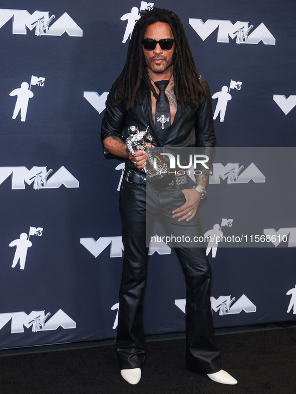 Lenny Kravitz, winner of the Best Rock award for 'Human' poses in the press room at the 2024 MTV Video Music Awards held at UBS Arena on Sep...