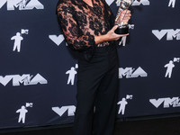 Benson Boone, winner of the Best Alternative Video award for 'Beautiful Things' poses in the press room at the 2024 MTV Video Music Awards h...