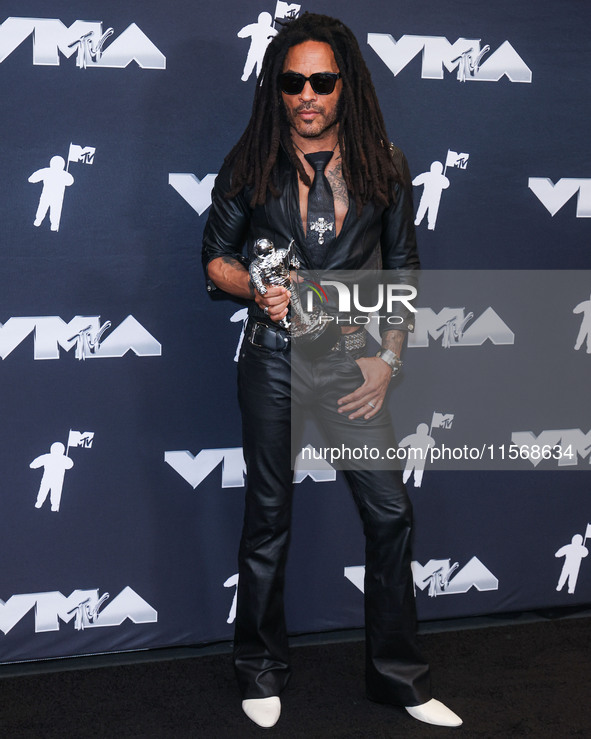 Lenny Kravitz, winner of the Best Rock award for 'Human' poses in the press room at the 2024 MTV Video Music Awards held at UBS Arena on Sep...