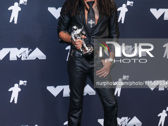 Lenny Kravitz, winner of the Best Rock award for 'Human' poses in the press room at the 2024 MTV Video Music Awards held at UBS Arena on Sep...