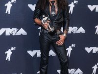 Lenny Kravitz, winner of the Best Rock award for 'Human' poses in the press room at the 2024 MTV Video Music Awards held at UBS Arena on Sep...