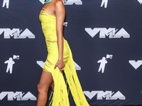 Tyla,  winner of the Best Afrobeats award for 'Water' poses in the press room at the 2024 MTV Video Music Awards held at UBS Arena on Septem...