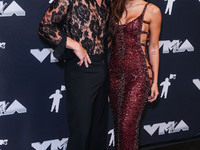 Benson Boone and Anitta pose in the press room at the 2024 MTV Video Music Awards held at UBS Arena on September 11, 2024 in Elmont, New Yor...