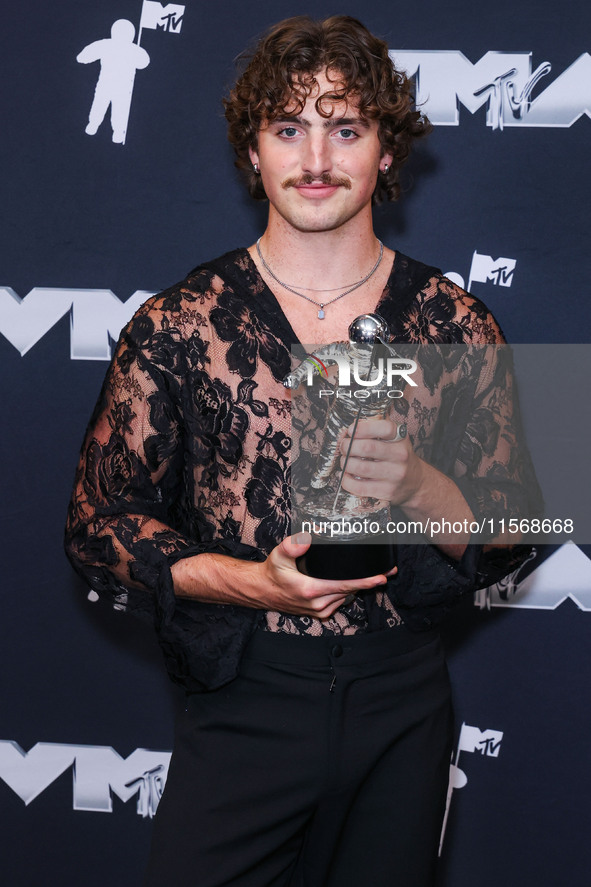 Benson Boone, winner of the Best Alternative Video award for 'Beautiful Things' poses in the press room at the 2024 MTV Video Music Awards h...