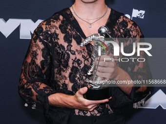 Benson Boone, winner of the Best Alternative Video award for 'Beautiful Things' poses in the press room at the 2024 MTV Video Music Awards h...