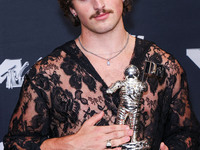 Benson Boone, winner of the Best Alternative Video award for 'Beautiful Things' poses in the press room at the 2024 MTV Video Music Awards h...