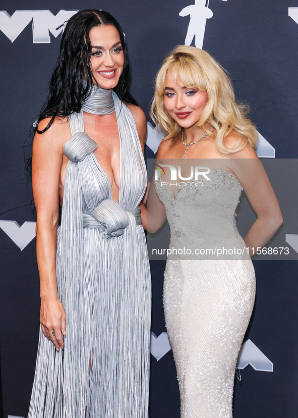 Katy Perry and Sabrina Carpenter pose in the press room at the 2024 MTV Video Music Awards held at UBS Arena on September 11, 2024 in Elmont...