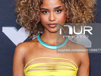 Tyla,  winner of the Best Afrobeats award for 'Water' poses in the press room at the 2024 MTV Video Music Awards held at UBS Arena on Septem...