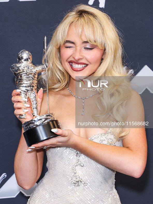 Sabrina Carpenter, winner of the Song of the Year award for 'Espresso' poses in the press room at the 2024 MTV Video Music Awards held at UB...